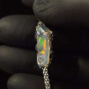 Opal Necklace — Ghostly Blue & Red Silhouettes