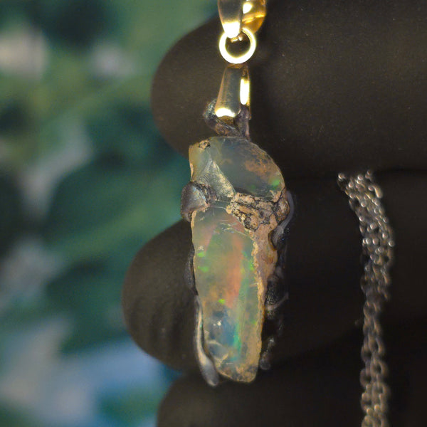 Opal Necklace — Ghostly Blue & Red Silhouettes