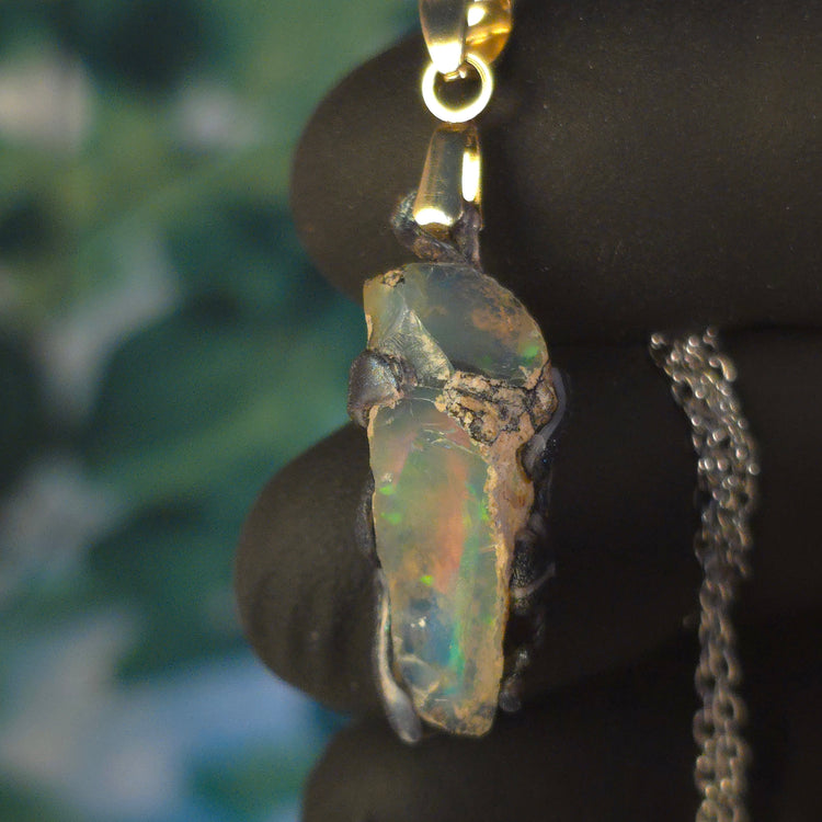 Opal Necklace — Ghostly Blue & Red Silhouettes